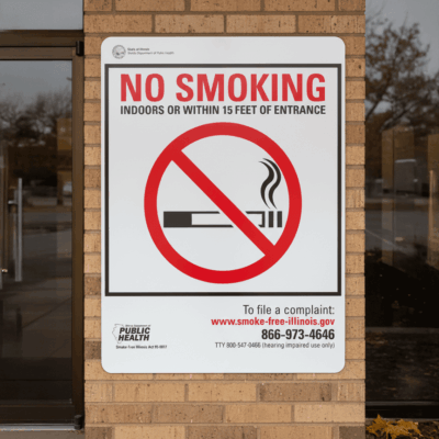No Smoking Indoors Or Within 15 Feet Of Entrance (Sym) To